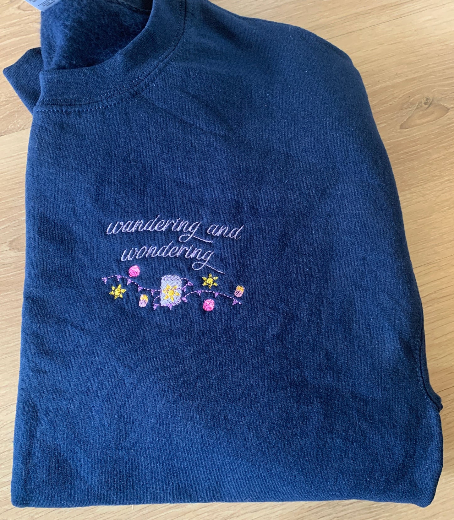 Sample - Medium - Navy sweatshirt with small 'wandering and wondering'