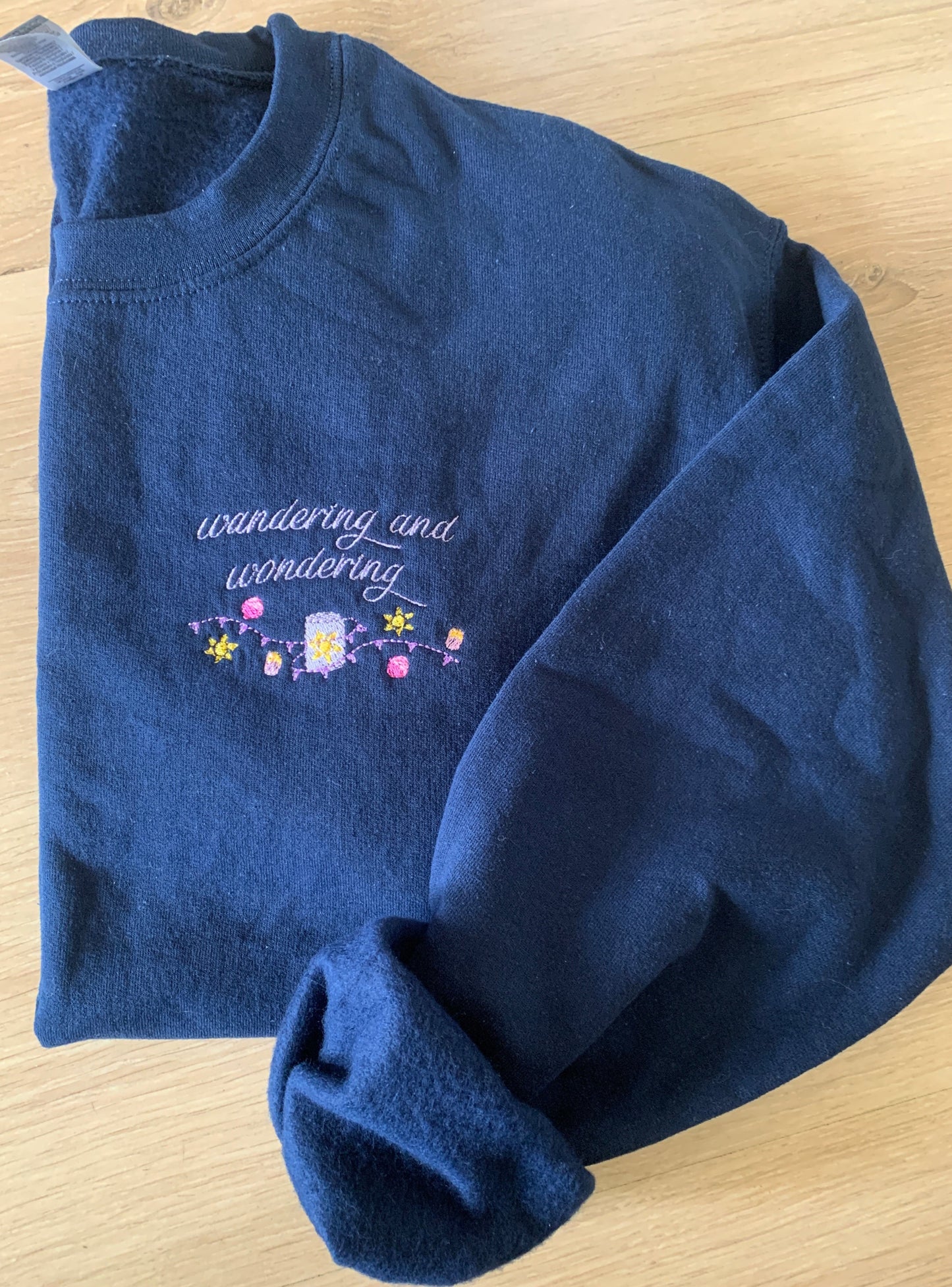 Sample - Medium - Navy sweatshirt with small 'wandering and wondering'