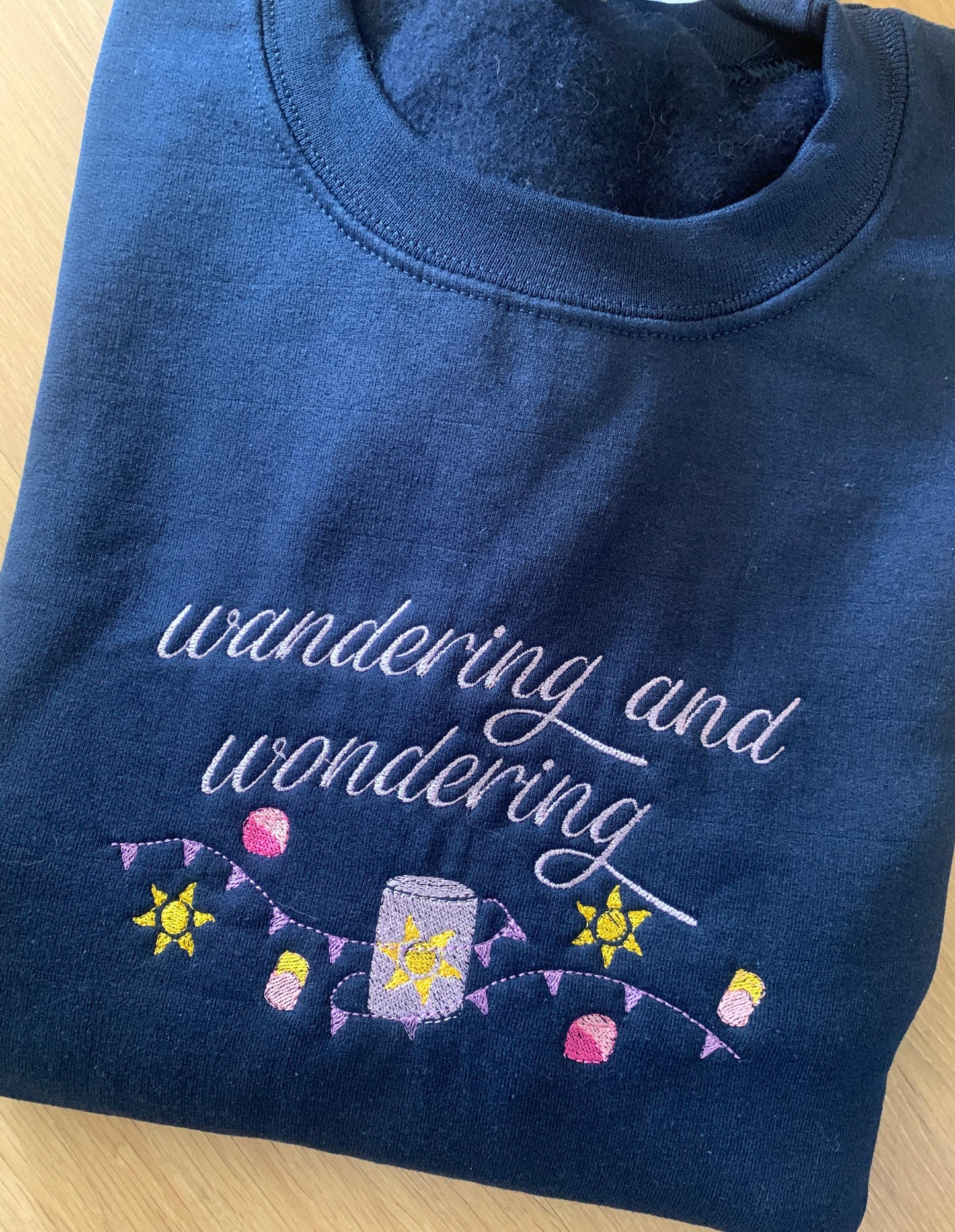 Second - Large - Navy Sweatshirt with 'Wandering Sun' Design